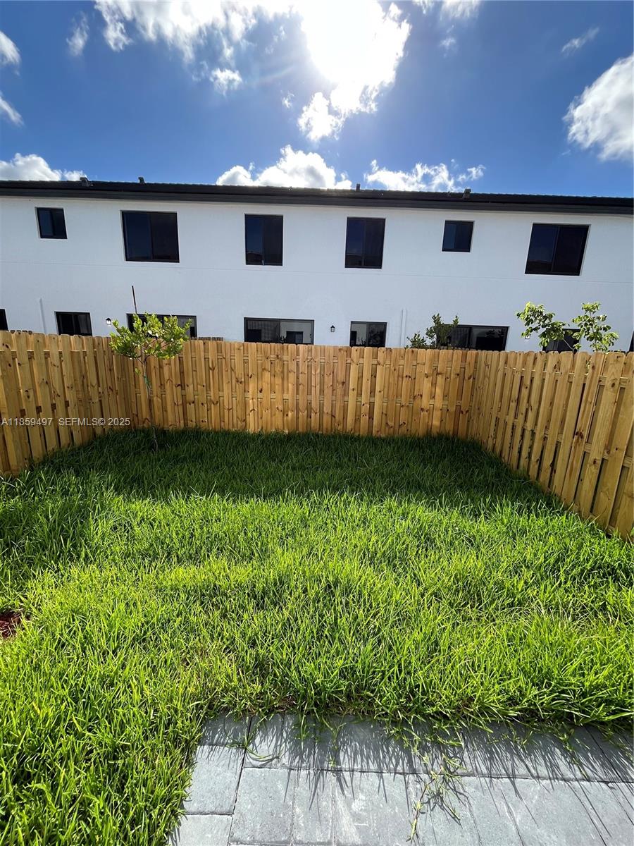 34515 Southwest 191st Court Homestead, FL 33034 - Photo 25 of 25 a view of a yard with an outdoor space