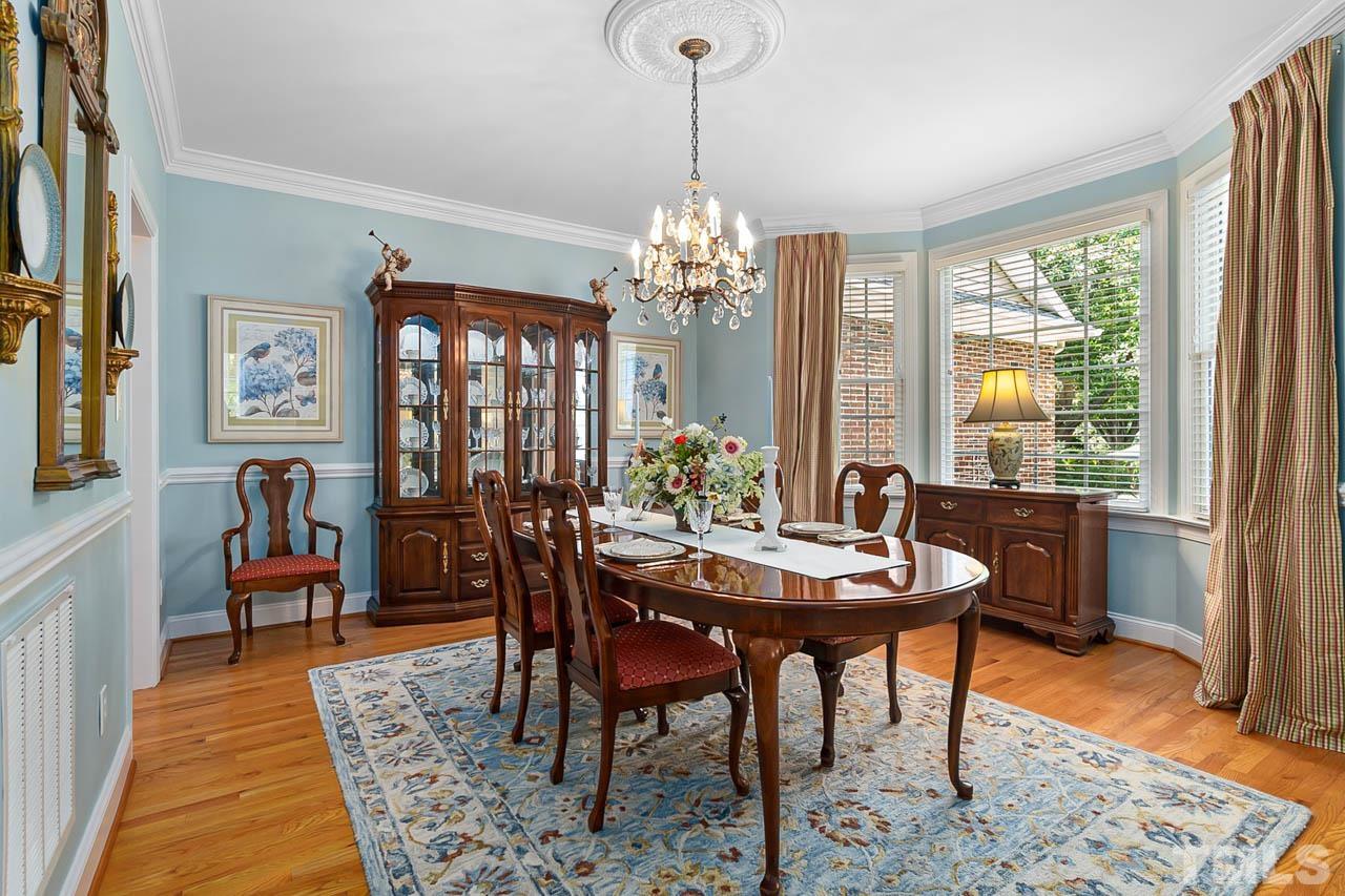 3500 Proprietor Way Raleigh, NC 27612 - Photo 14 of 47 a view of a dining room with furniture window and wooden floor