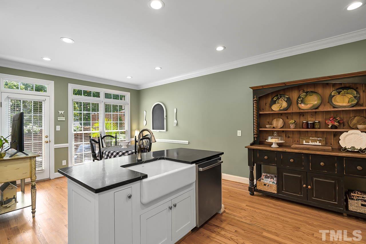 3500 Proprietor Way Raleigh, NC 27612 - Photo 23 of 47 a kitchen with a sink and cabinets