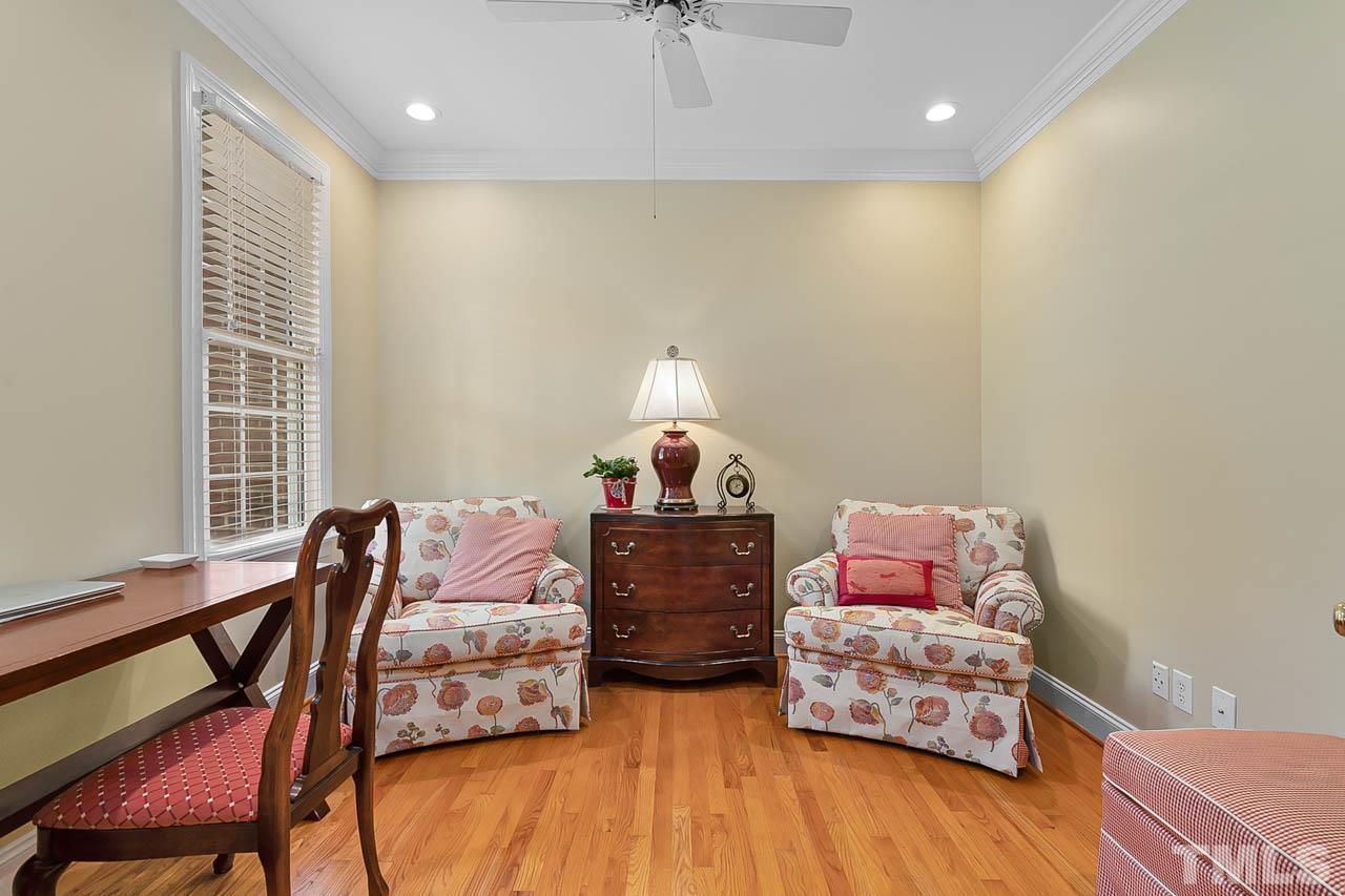 3500 Proprietor Way Raleigh, NC 27612 - Photo 6 of 47 a bedroom with a bed and wooden floor