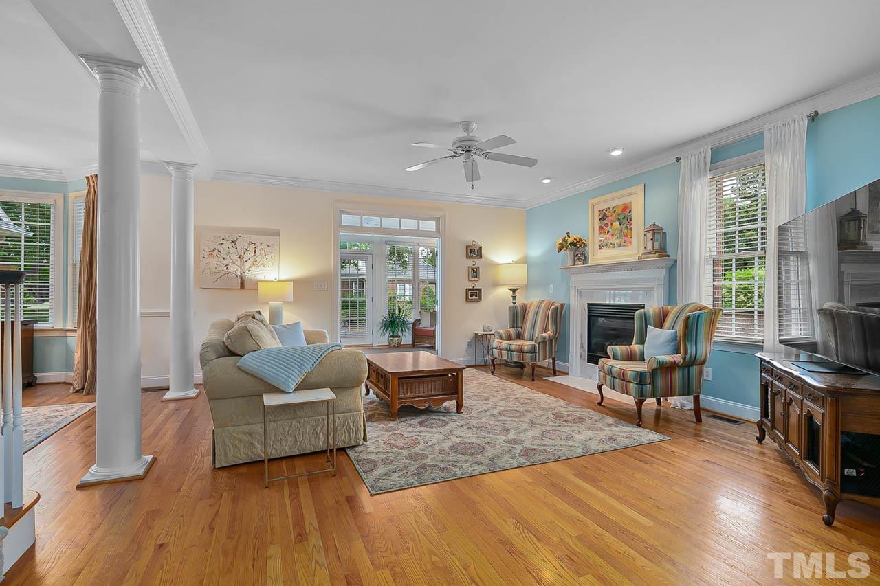 3500 Proprietor Way Raleigh, NC 27612 - Photo 8 of 47 a living room with furniture fireplace and a flat screen tv