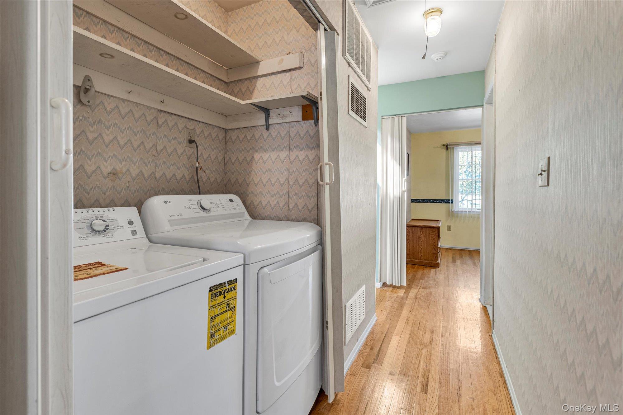 20 Primrose Lane North Babylon, NY 11703 - Photo 15 of 19 a utility room with dryer and washer