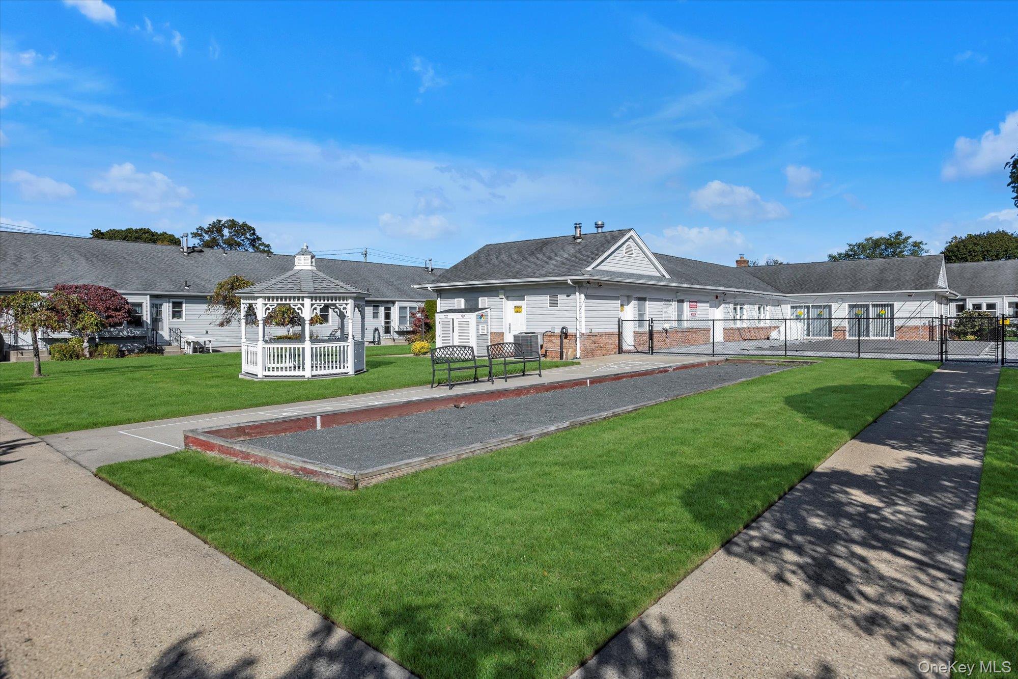 20 Primrose Lane North Babylon, NY 11703 - Photo 18 of 19 a front view of a house with yard and green space