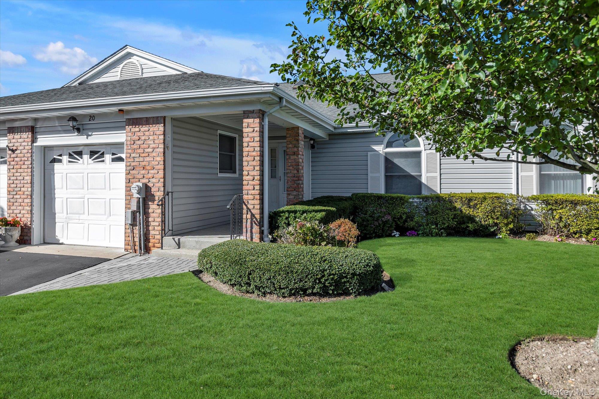 20 Primrose Lane North Babylon, NY 11703 - Photo 2 of 19 a front view of a house with a yard