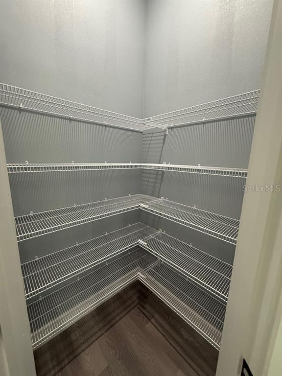 14919 Southwest 46th Circle Ocala, FL 34473 - Photo 3 of 22 a view of a room with racks on the wall