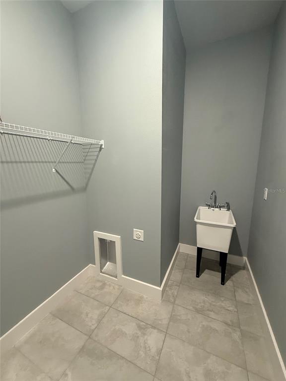 14919 Southwest 46th Circle Ocala, FL 34473 - Photo 9 of 22 a bathroom with a sink and a toilet