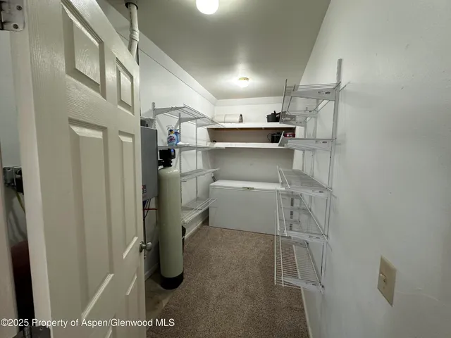 a view of storage and utility room