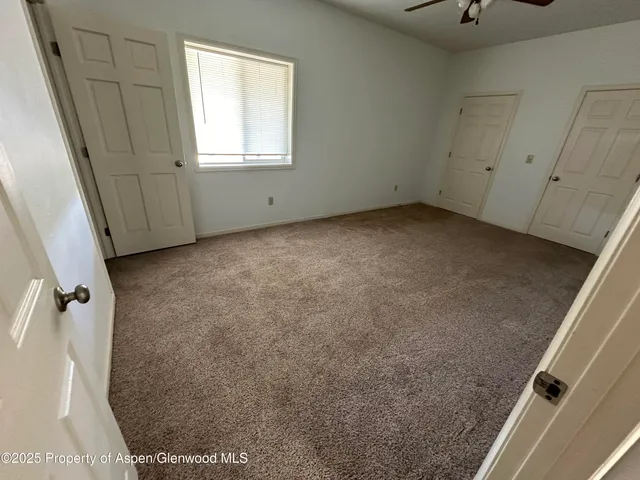 a view of a room with an empty space