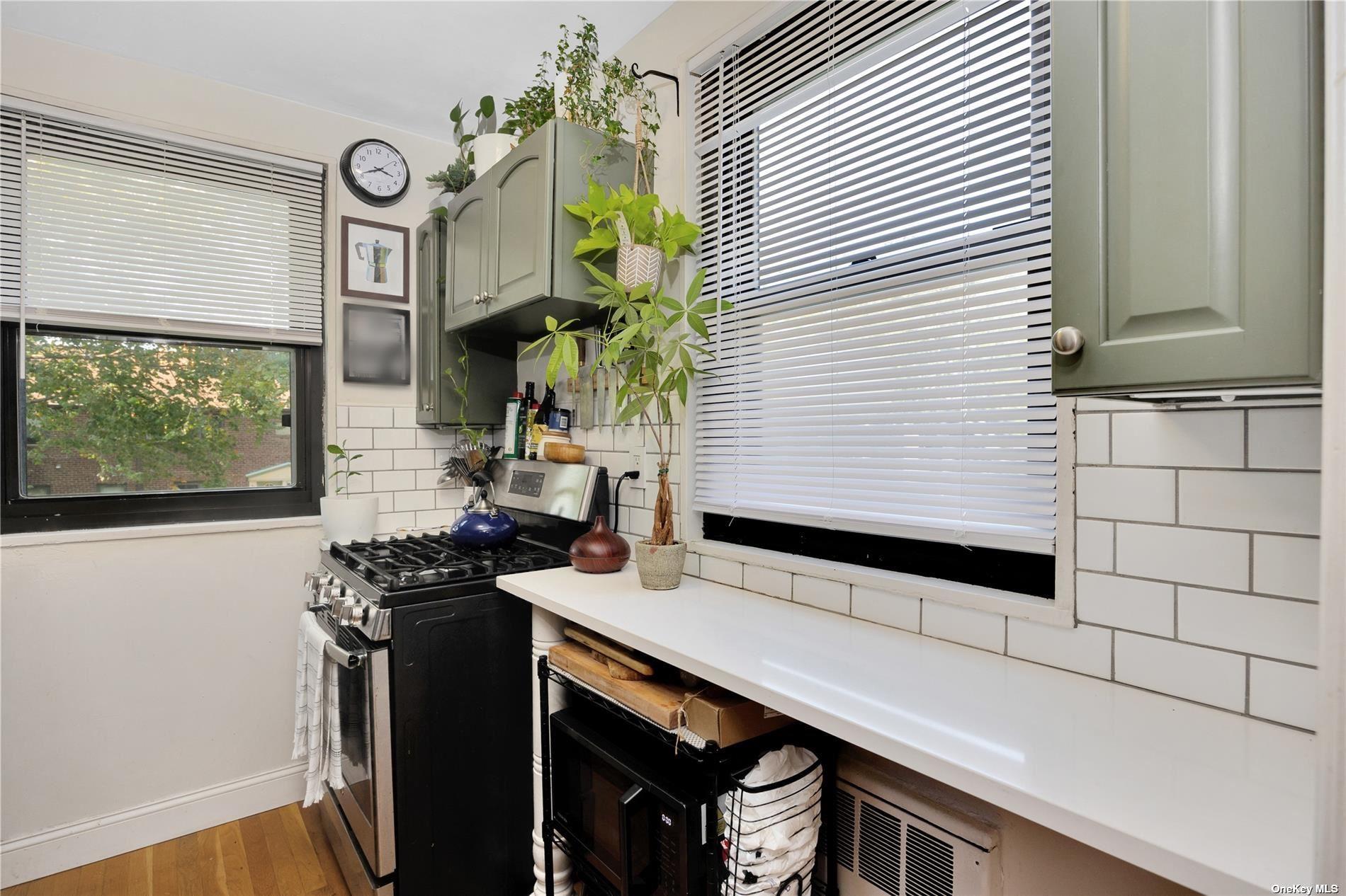 57-32 246th Crescent, Unit E15 Queens, NY 11362 - Photo 11 of 13 Galley Kitchen