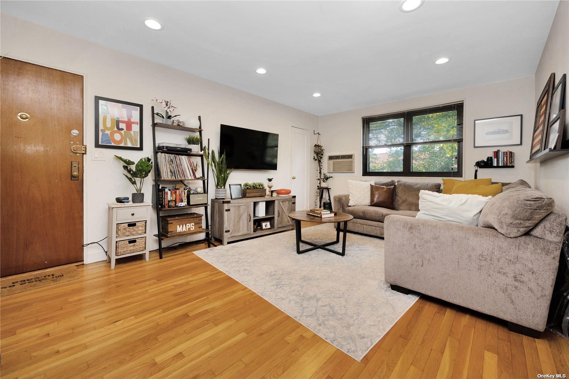 57-32 246th Crescent, Unit E15 Queens, NY 11362 - Photo 5 of 13 Living Room