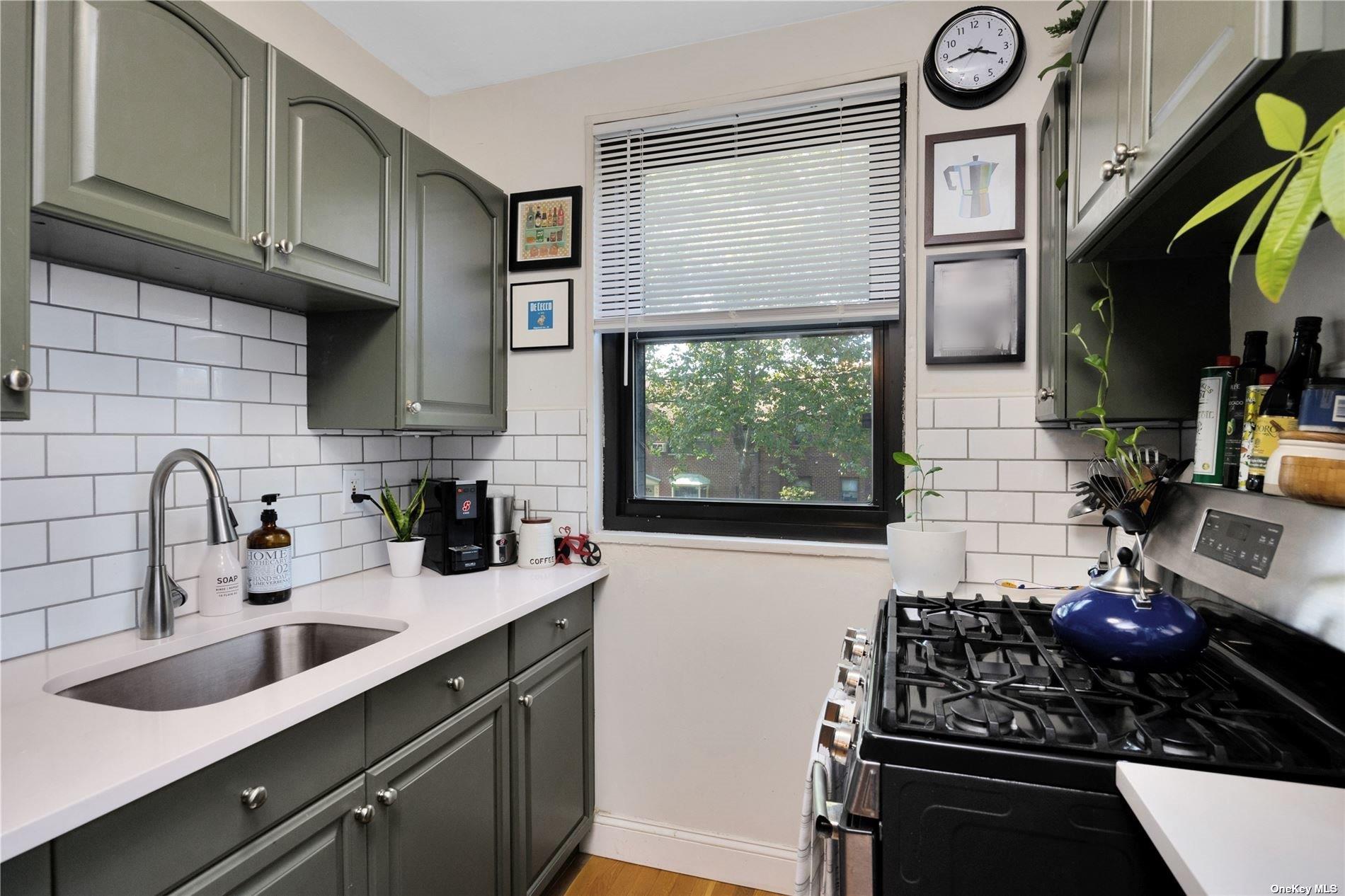 57-32 246th Crescent, Unit E15 Queens, NY 11362 - Photo 9 of 13 Galley Kitchen