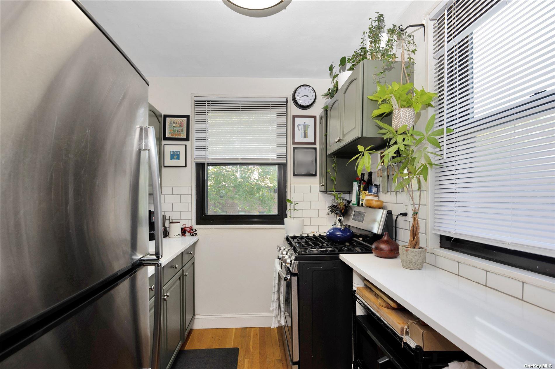 57-32 246th Crescent, Unit E15 Queens, NY 11362 - Photo 10 of 13 Galley Kitchen