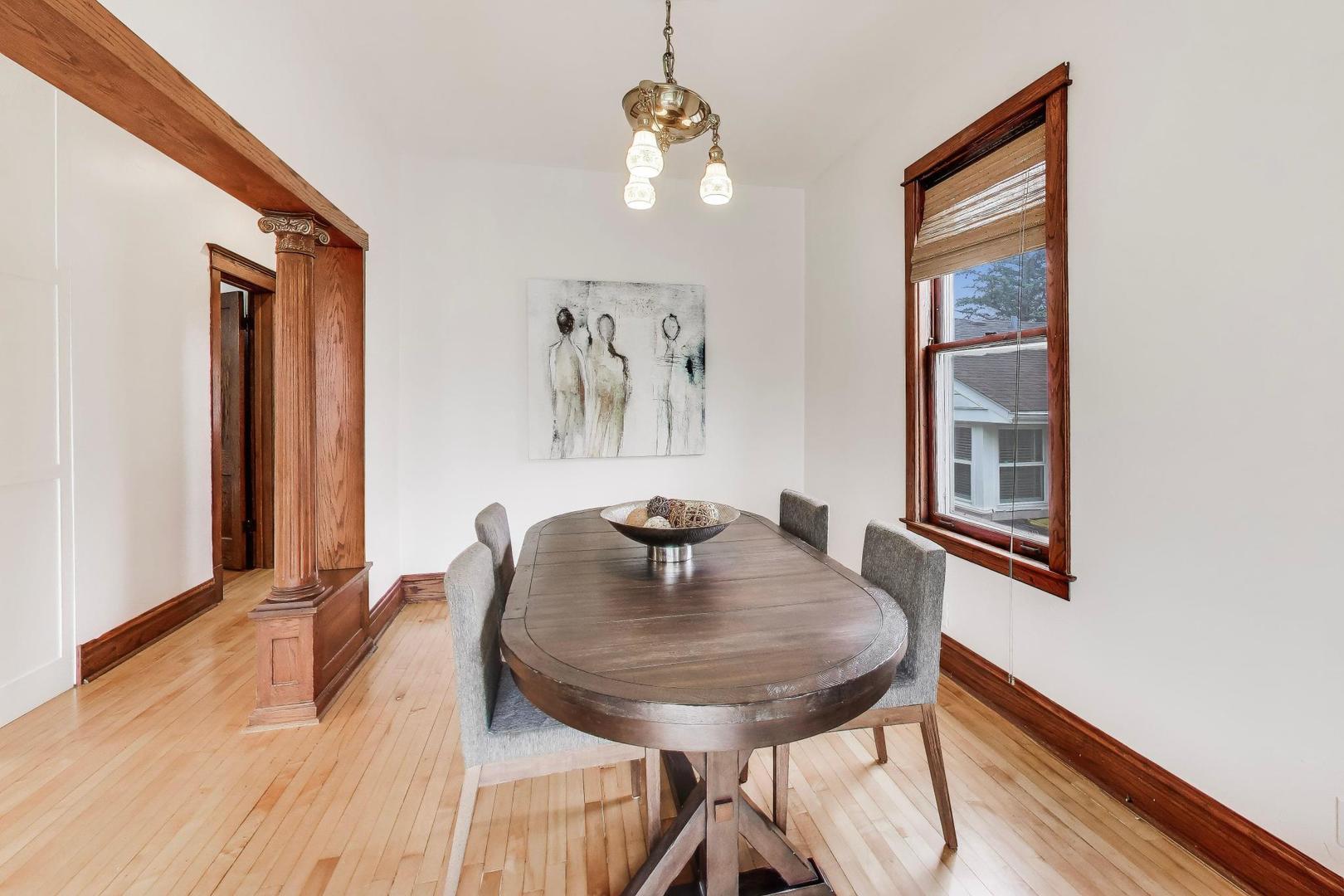 256 Blackhawk Road Riverside, IL 60546 - Photo 15 of 73 a view of a dining room with furniture and window