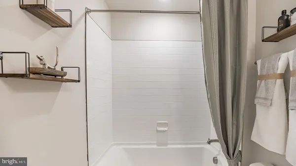 a bathroom with a bathtub