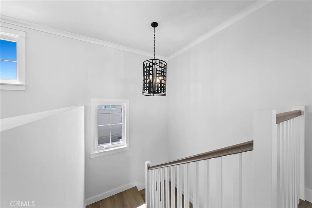 309 Crest Drive Manhattan Beach, CA 90266 - Photo 12 of 27 a view of a hallway with windows