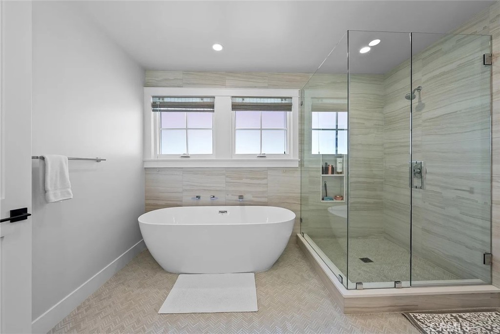 309 Crest Drive Manhattan Beach, CA 90266 - Photo 15 of 27 a bathroom with a shower and window