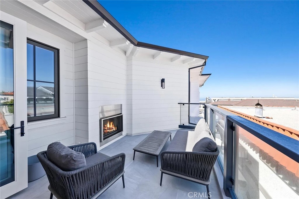 309 Crest Drive Manhattan Beach, CA 90266 - Photo 10 of 27 a outdoor living space with furniture and a fireplace