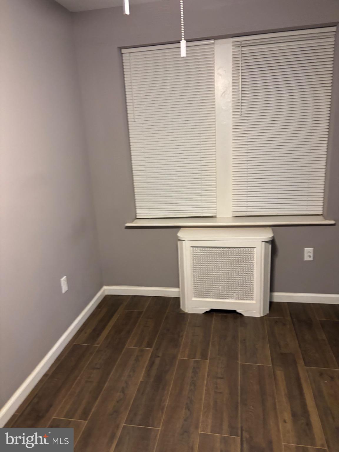 2113 Kennedy Street Philadelphia, PA 19124 - Photo 5 of 10 a view of empty room with wooden floor and fan