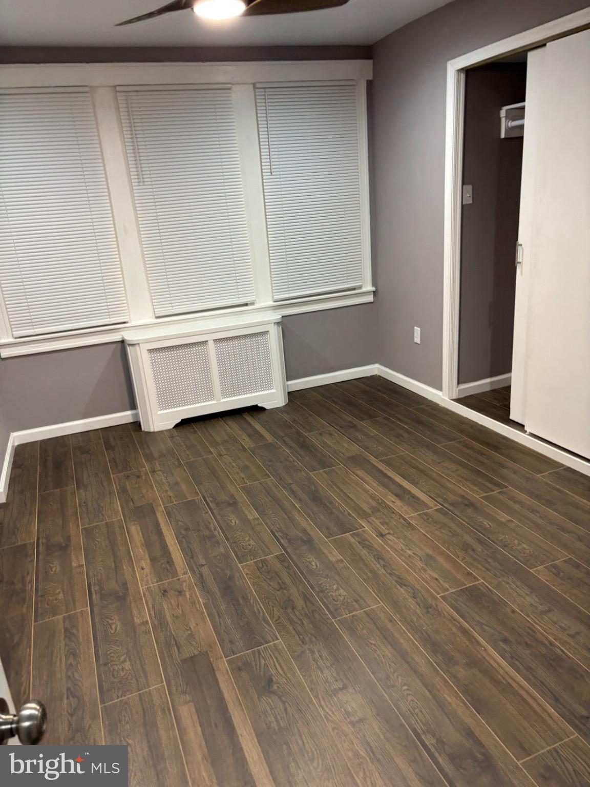 2113 Kennedy Street Philadelphia, PA 19124 - Photo 7 of 10 a view of an empty room with wooden floor