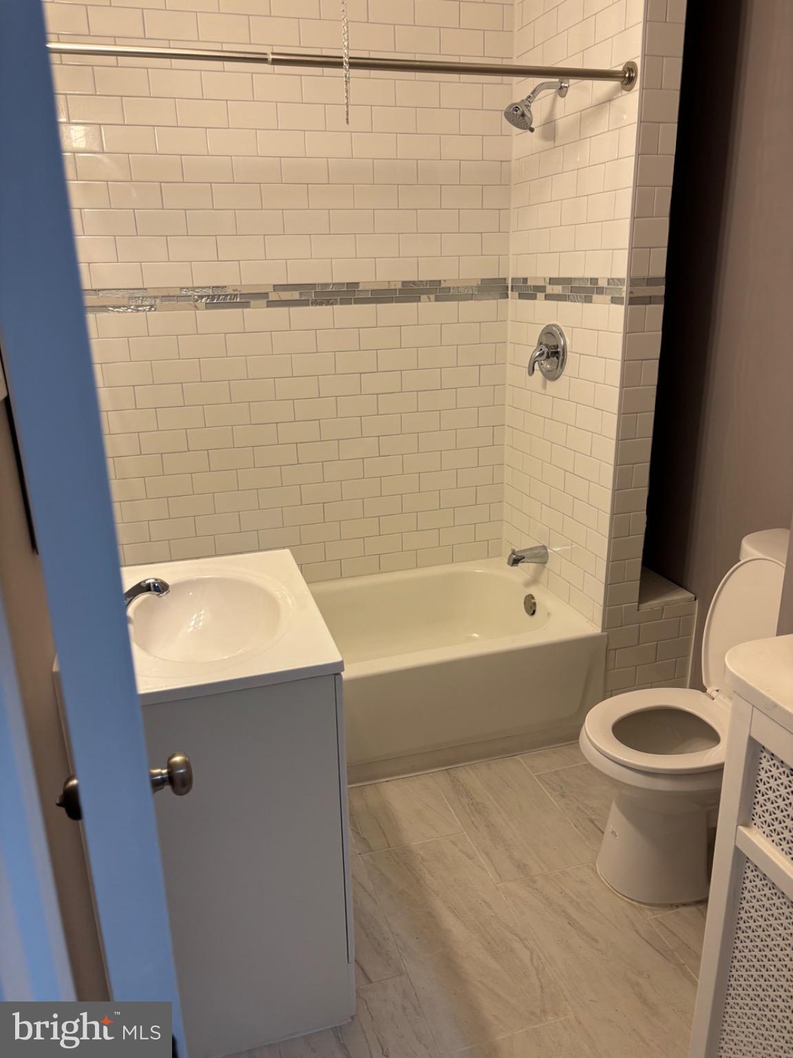 2113 Kennedy Street Philadelphia, PA 19124 - Photo 8 of 10 a bathroom with a bathtub and a shower