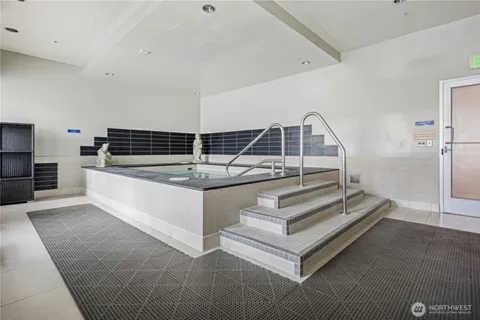 a view of entryway and kitchen