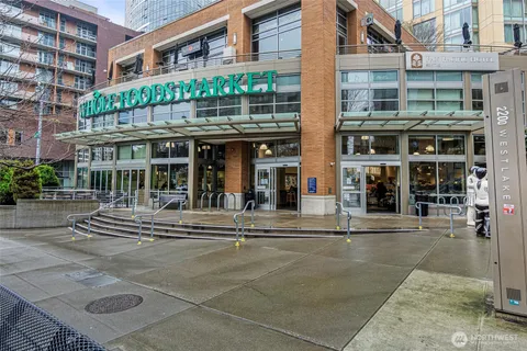 a front view of a building and a entrance gate