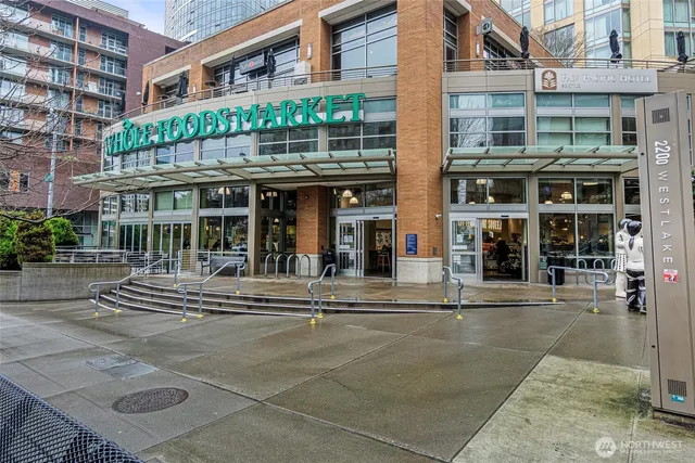a front view of a building and a entrance gate
