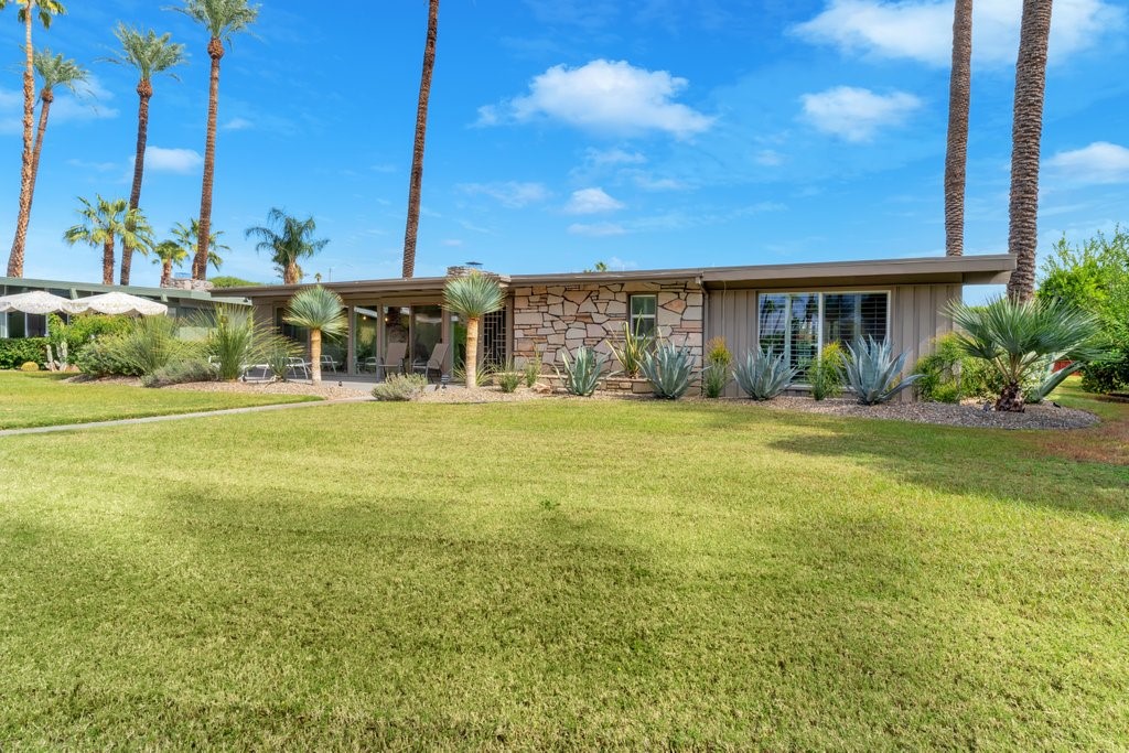 36927 Palm View Road Rancho Mirage, CA 92270 - Photo 11 of 18 a view of a house with a yard