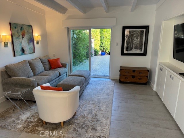 36927 Palm View Road Rancho Mirage, CA 92270 - Photo 14 of 18 a living room with furniture and a large window
