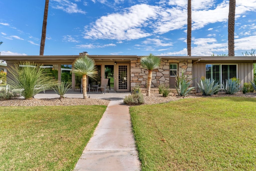 36927 Palm View Road Rancho Mirage, CA 92270 - Photo 2 of 18 a view of a house with backyard porch and sitting area