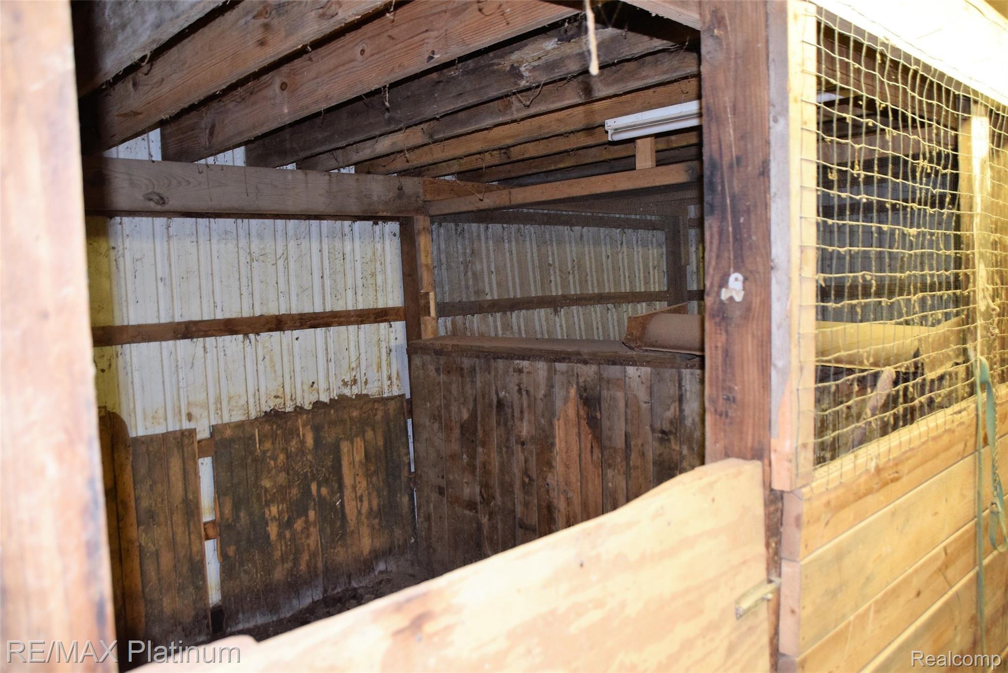 7525 Fisher Road Howell, MI 48855 - Photo 36 of 54 barn horse stall.JPG