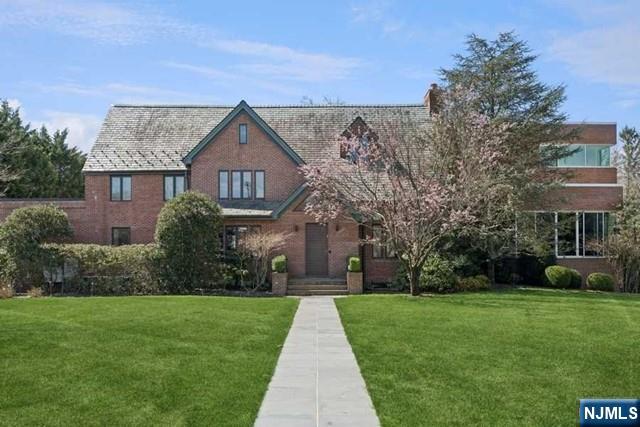 532 Winthrop Road Teaneck, NJ 07666 - Photo 1 of 42 a front view of house with yard and green space