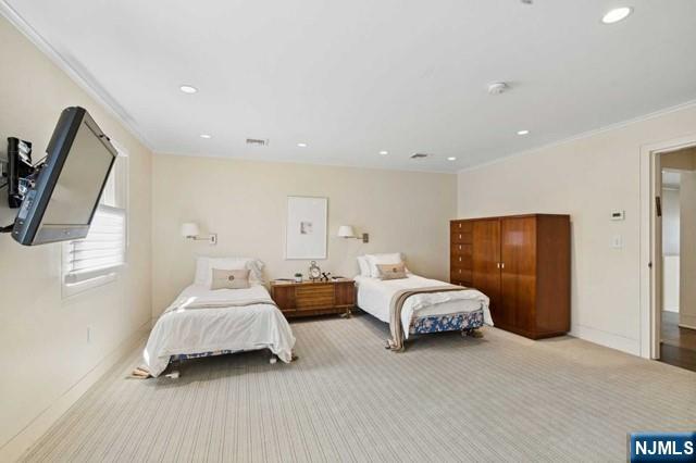 532 Winthrop Road Teaneck, NJ 07666 - Photo 25 of 42 a spacious bedroom with two beds and painting on the wall