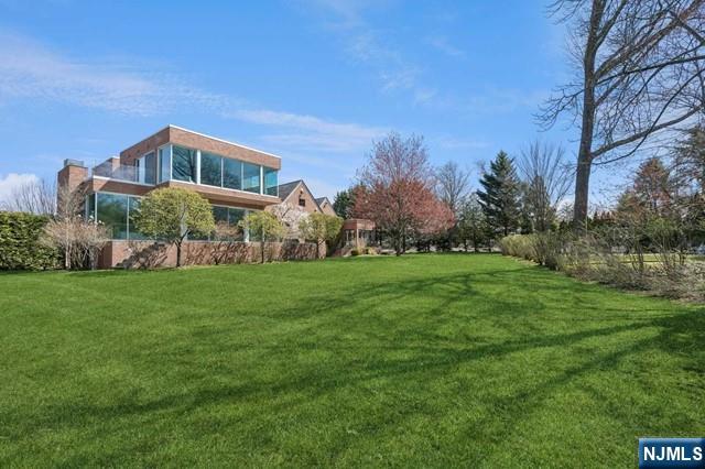 532 Winthrop Road Teaneck, NJ 07666 - Photo 35 of 42 a view of a house with a yard