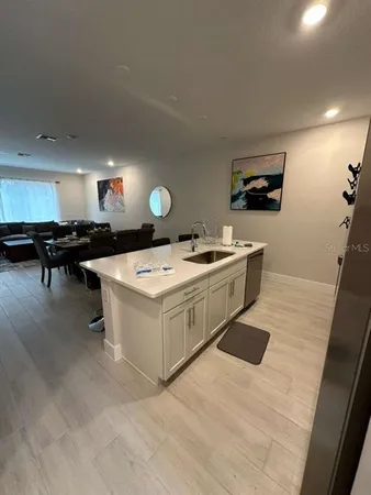 a view of a lake with outdoor seating