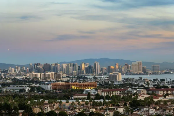 a view of a city with tall buildings