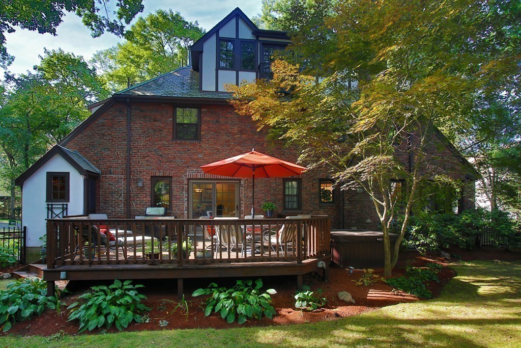 94 Devonshire Road Newton, MA 02468 - Photo 17 of 17 a view of a house with wooden deck and furniture