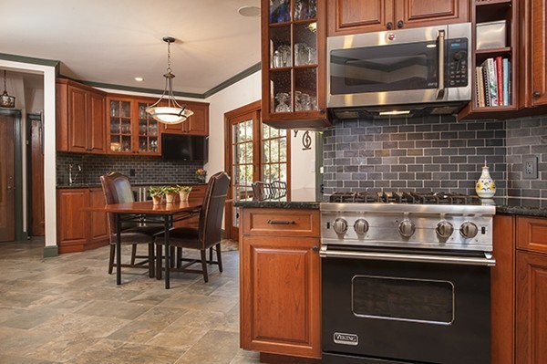 94 Devonshire Road Newton, MA 02468 - Photo 4 of 17 a kitchen with a stove and a microwave