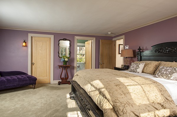 94 Devonshire Road Newton, MA 02468 - Photo 7 of 17 a bed room with a bed and a mirror