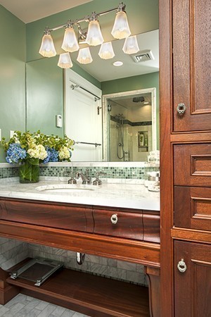 94 Devonshire Road Newton, MA 02468 - Photo 8 of 17 a bathroom with a sink and a mirror