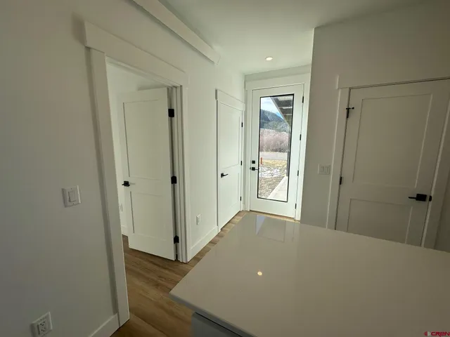 a bathroom with a sink toilet and mirror