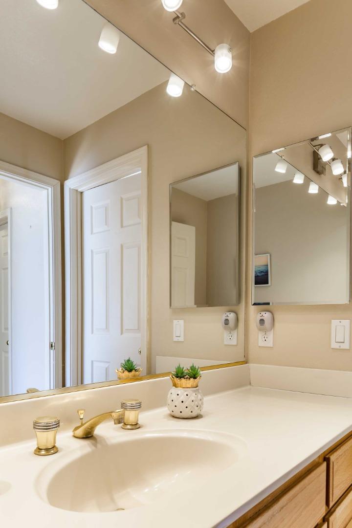 2052 Jamison Place Santa Clara, CA 95051 - Photo 12 of 24 a bathroom with a sink and a mirror