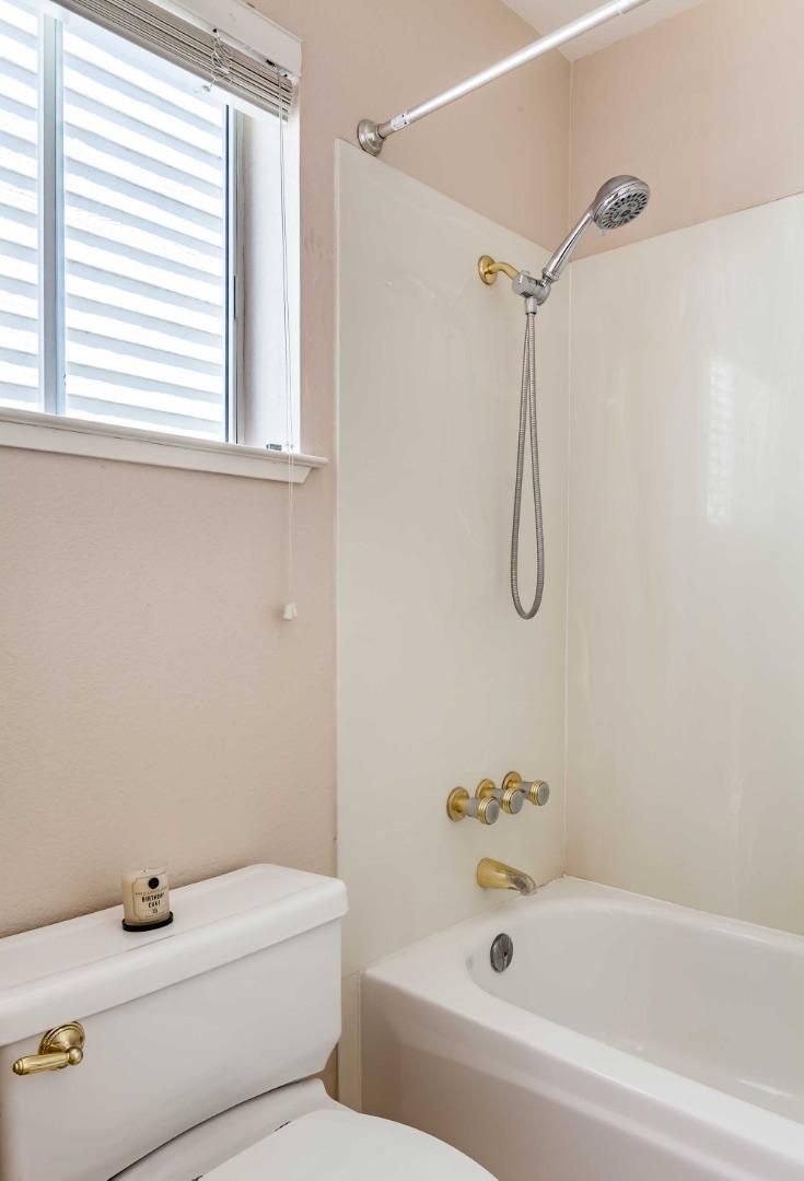 2052 Jamison Place Santa Clara, CA 95051 - Photo 13 of 24 a bathroom with a white a sink a window and a shower
