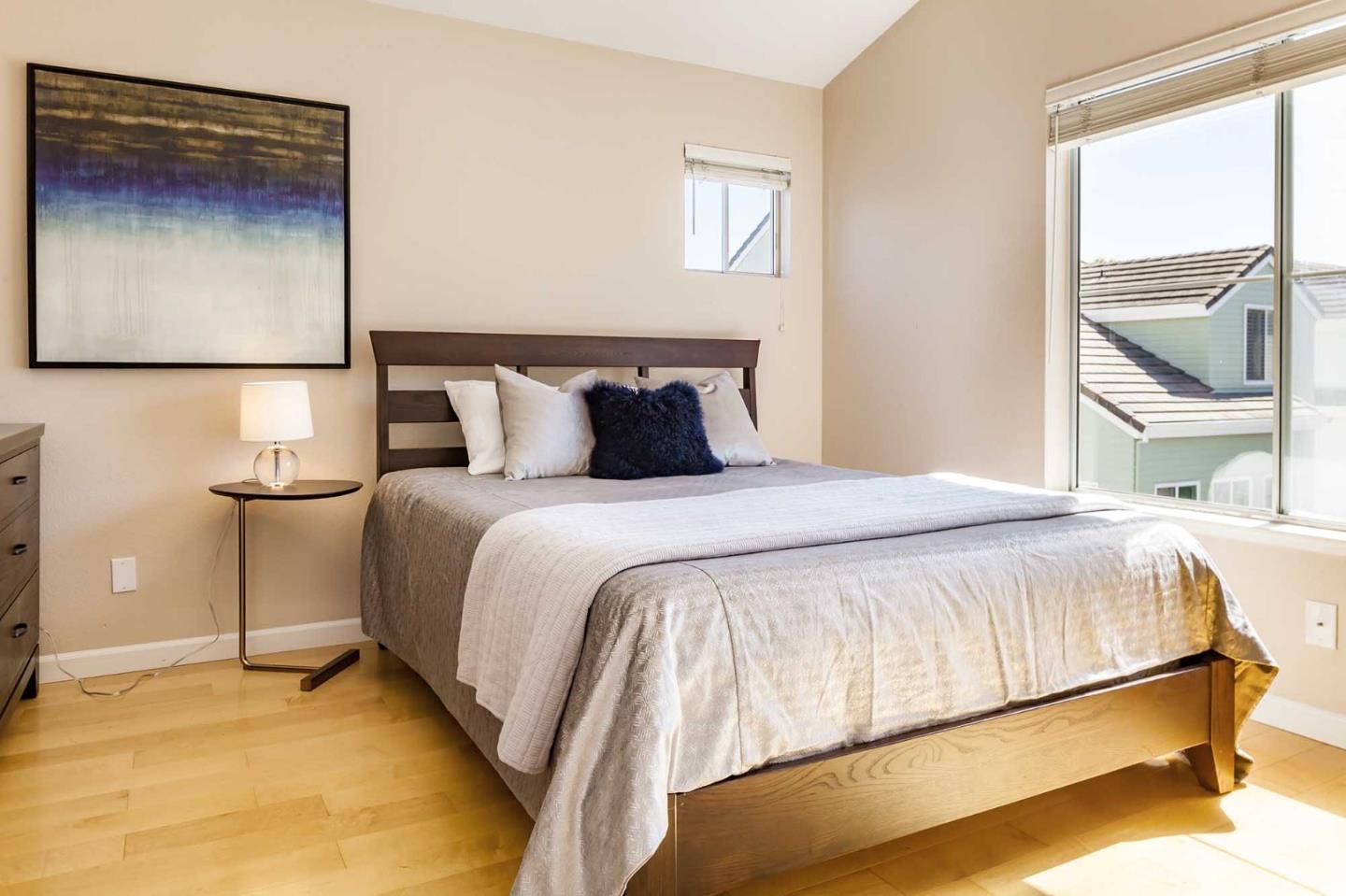 2052 Jamison Place Santa Clara, CA 95051 - Photo 15 of 24 a bedroom with a bed and glass window