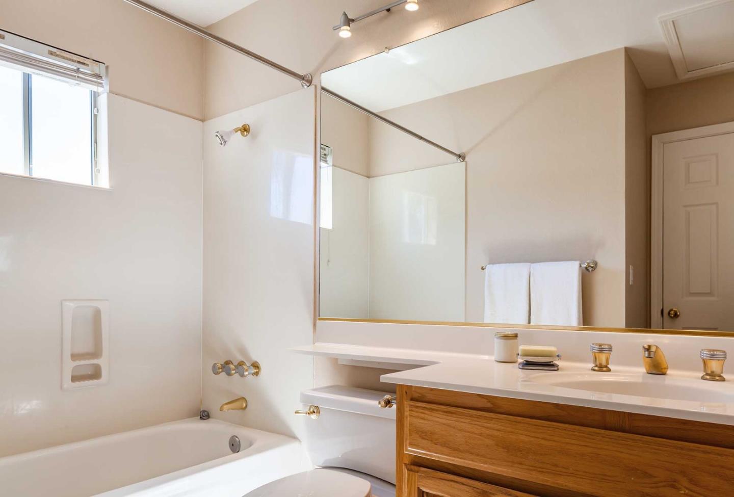 2052 Jamison Place Santa Clara, CA 95051 - Photo 16 of 24 a bathroom with a sink and a mirror