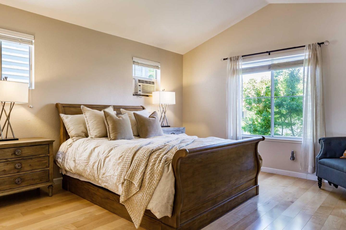 2052 Jamison Place Santa Clara, CA 95051 - Photo 18 of 24 a bed sitting in a bedroom next to a window