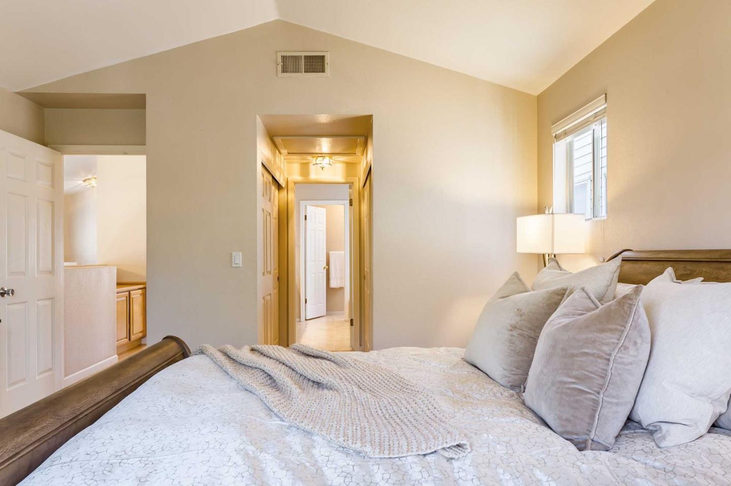 2052 Jamison Place Santa Clara, CA 95051 - Photo 19 of 24 a bedroom with a bed and a window