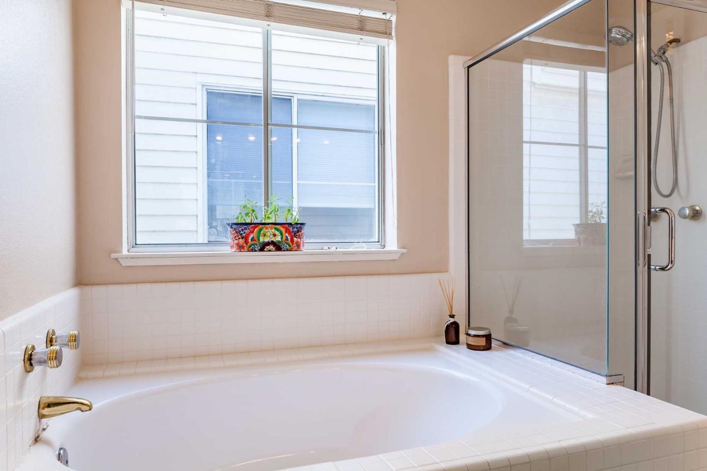 2052 Jamison Place Santa Clara, CA 95051 - Photo 21 of 24 a white bath tub sitting next to a window