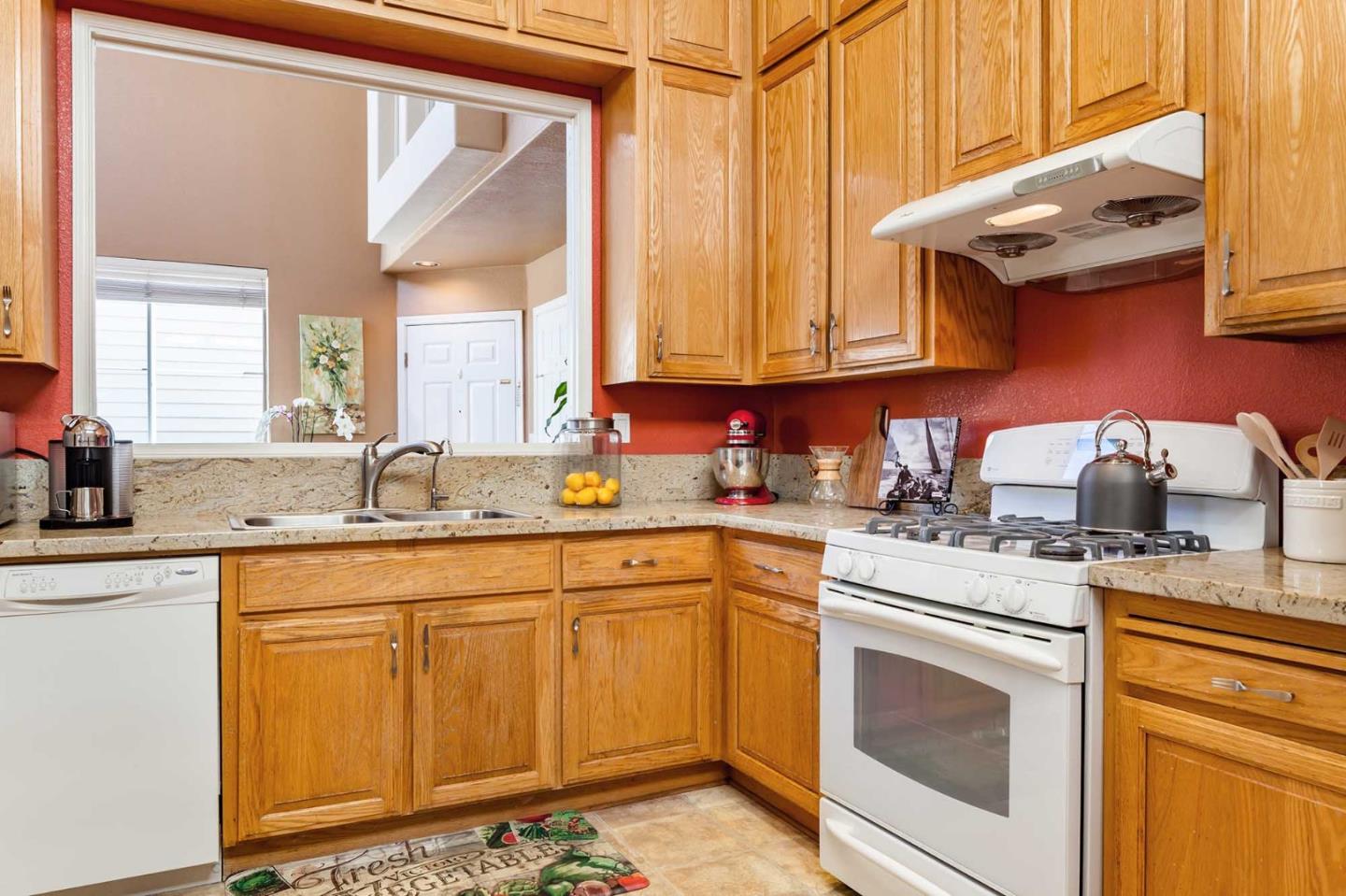 2052 Jamison Place Santa Clara, CA 95051 - Photo 9 of 24 a kitchen with stainless steel appliances granite countertop a sink stove and cabinets