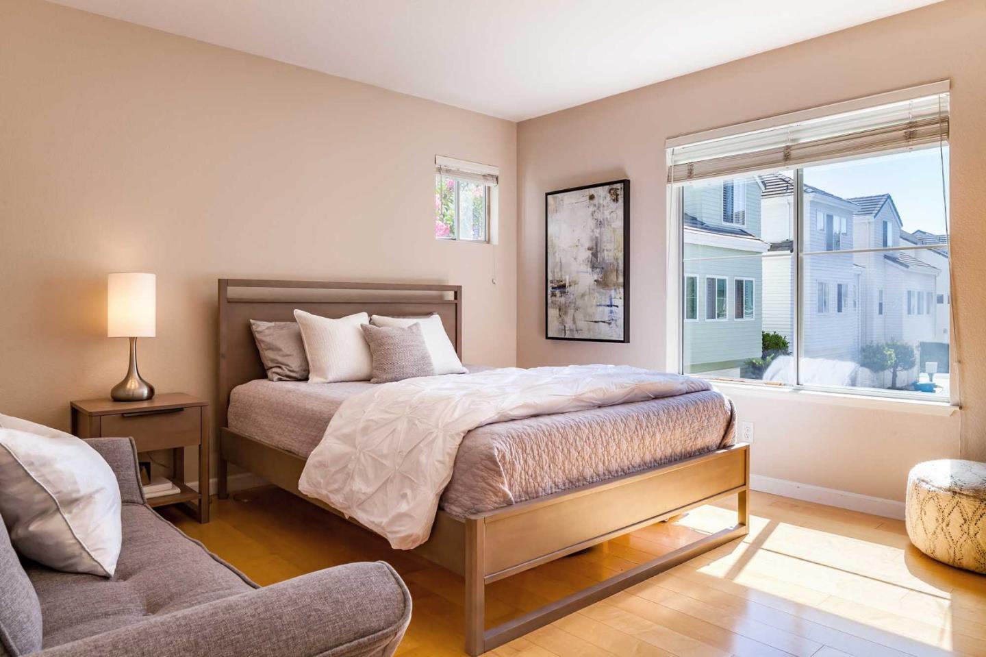 2052 Jamison Place Santa Clara, CA 95051 - Photo 10 of 24 a spacious bedroom with a bed and wooden floor